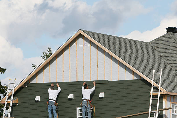 Professional Storm Damage Siding Repair technician working in South Lebanon, OH